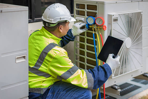 Professional Heat Pump Repair technician working in Freedom, IN
